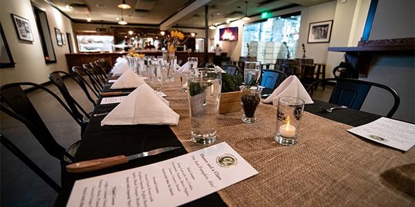 Tables set up for event in tasting room